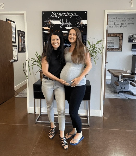 Chiropractor Santa Clarita CA Carolyn Griffin With Pregnant Patient